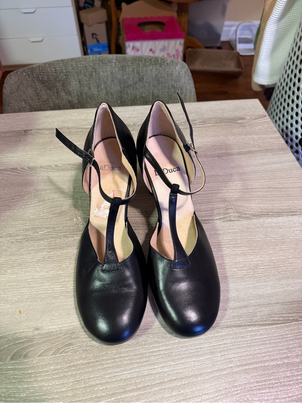 LaDuca Leather T‑Strap Heels in Black